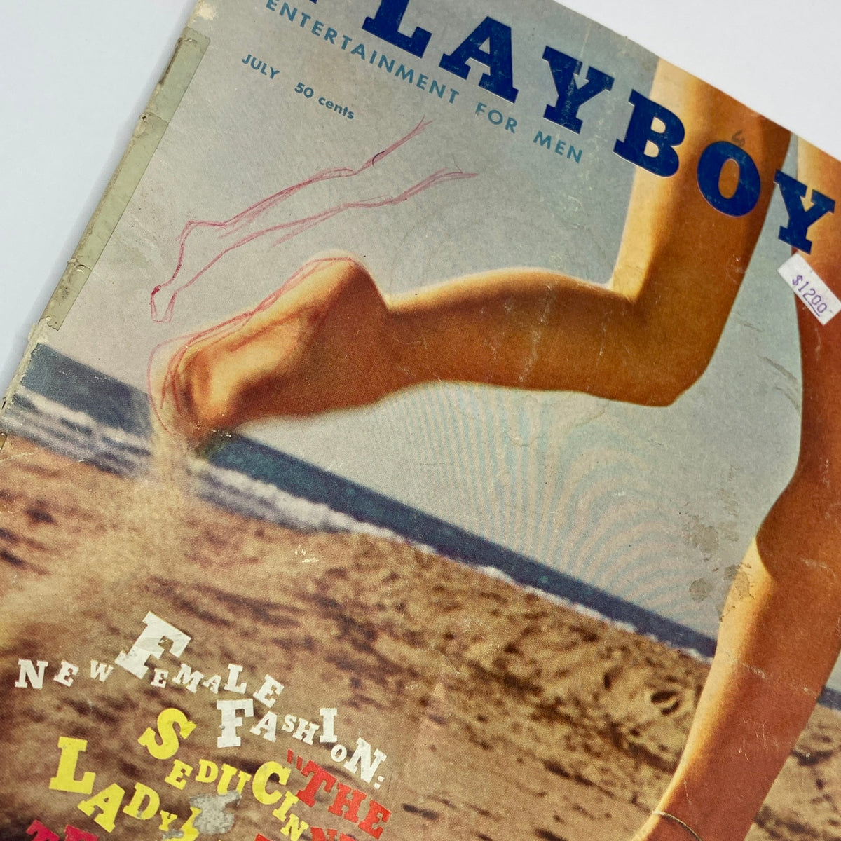Close-up of the cover of VTG Playboy Magazine July 1960, highlighting the design elements and Teddi Smith's centerfold.