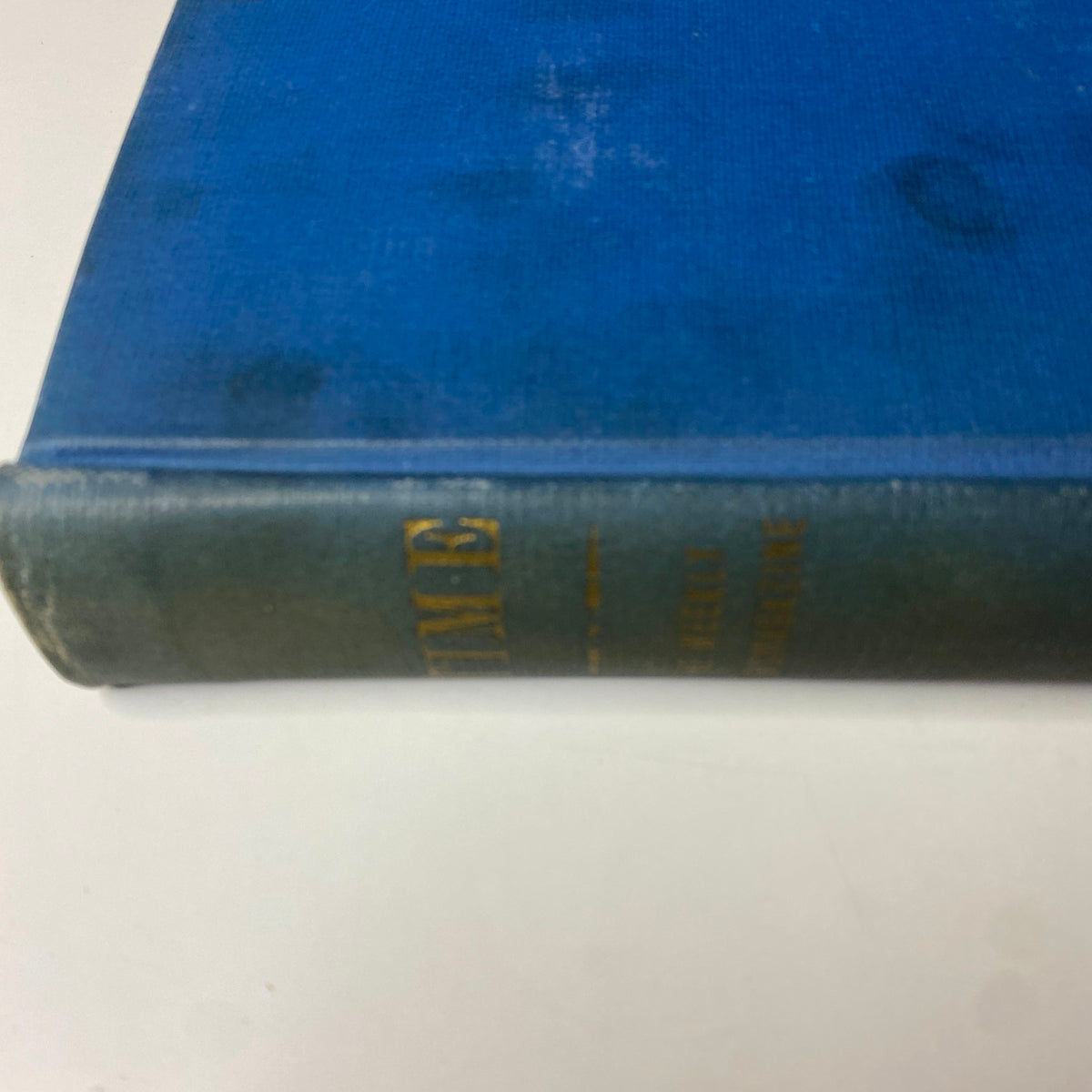Side view of the blue bound volume of 'Time Magazine', dated October 3 to December 26, 1932, highlighting its distinct binding.