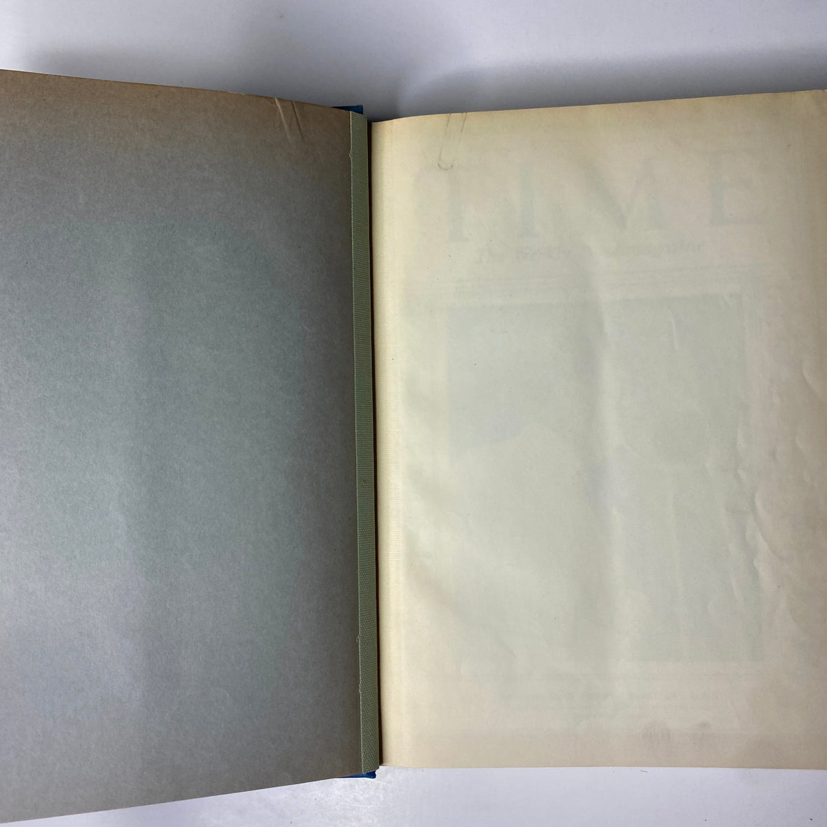 Inside view of a Time Magazine Library Bound edition featuring a blank page. Title: Time Magazine Library Bound October 3- December 26, 1932 T.E. Lawrence ARABIA.