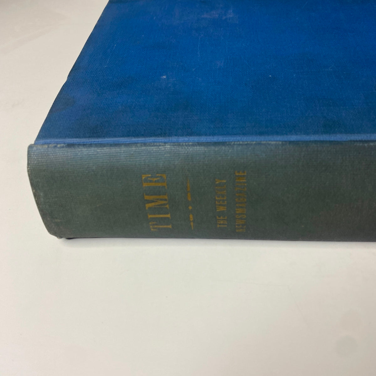 Time Magazine Library Bound January 7- March 25, 1935 - Another side view of the blue bound volume, showcasing its spine and title indicating its archival nature.