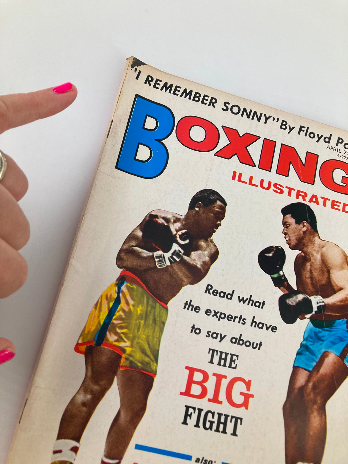 Close-up of the cover of VTG Boxing Illustrated Magazine April 1971, highlighting the headline about the big fight between Muhammad Ali and Joe Frazier.