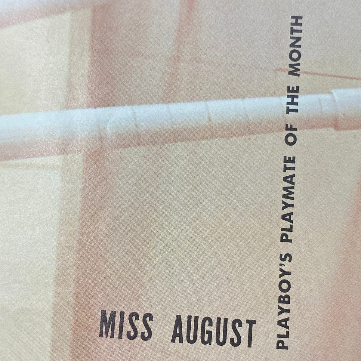 Playboy Magazine August 1962 interior page showcasing the headline 'Miss August' highlighting the Playmate of the Month.