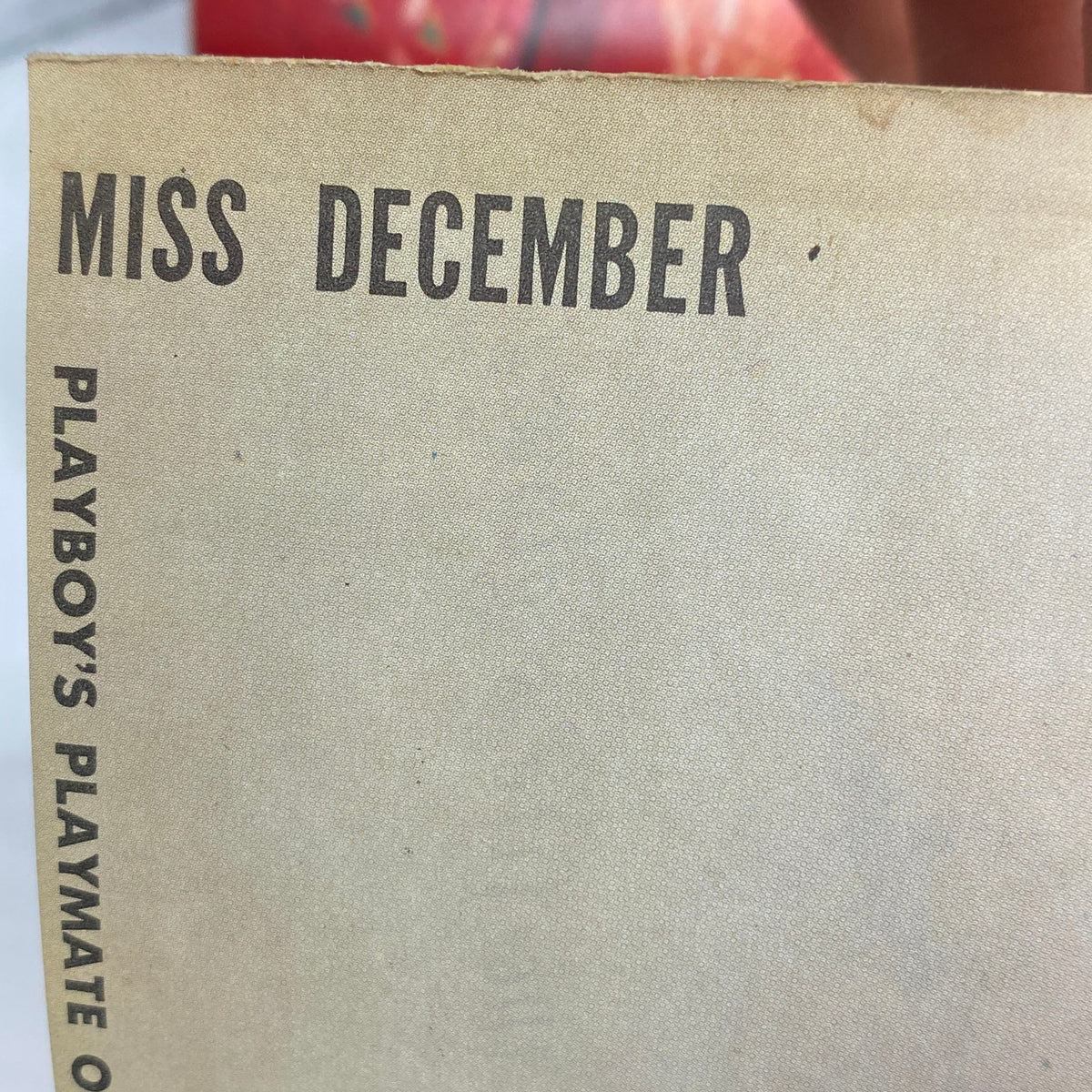 Page from VTG Playboy Magazine December 1960 labeled 'Miss December,' featuring promotional content about the centerfold model.