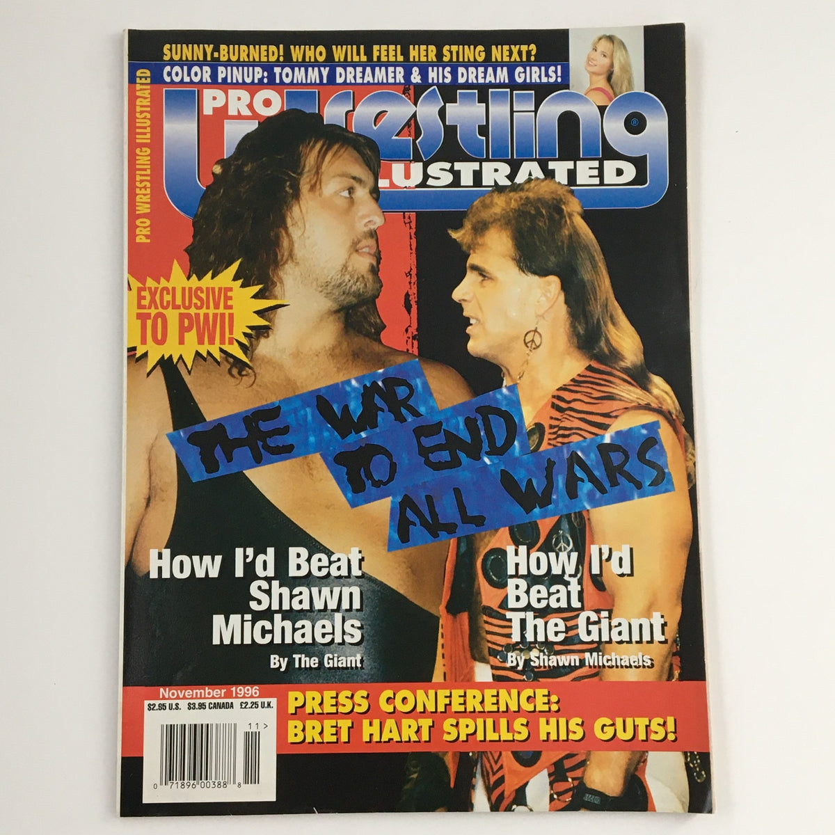 Pro Wrestling Illustrated November 1996 cover featuring The Giant and Shawn Michaels, highlighting their featured articles and exclusive poster.