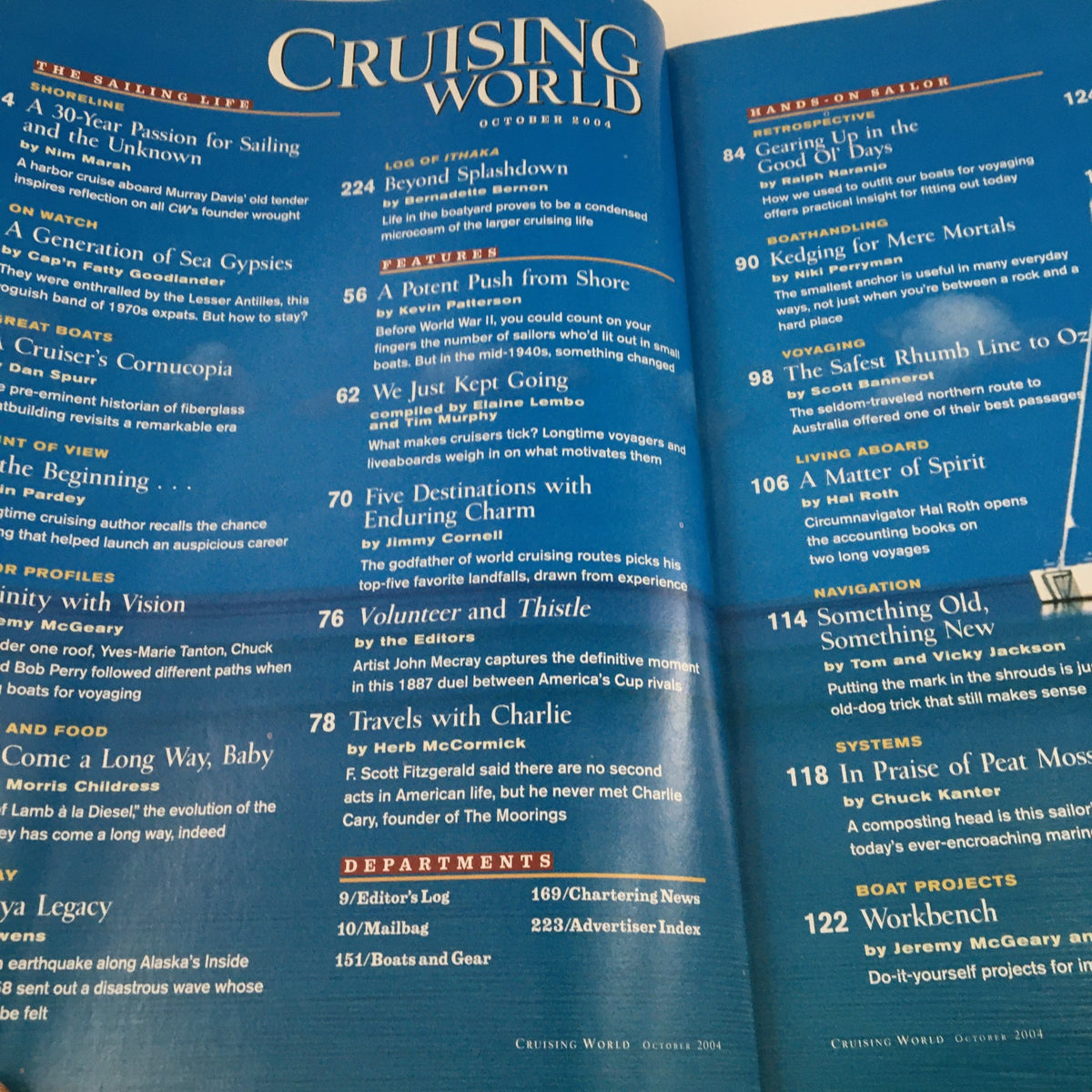 Inside spread of Cruising World Magazine, October 2004, showcasing articles including 'A Potent Push From Shore' and 'Five Destinations Enduring Charm'. The layout highlights various engaging stories and features about sailing.