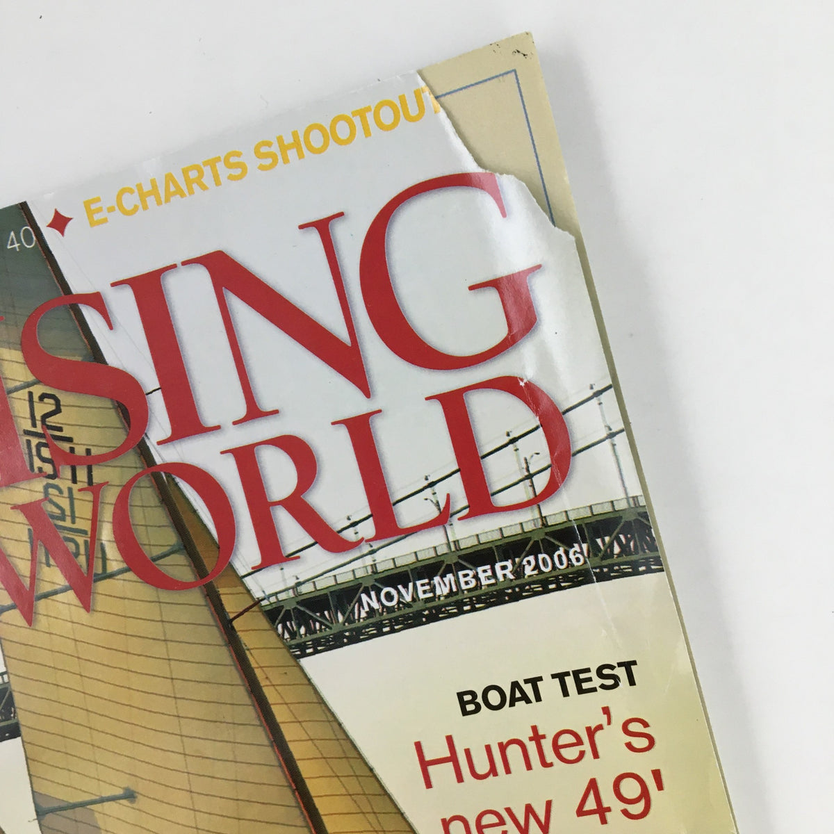 Cover of Cruising World Magazine November 2006 featuring the title 'The Merry Wives of the Windwards,' showing significant wear including a torn edge.