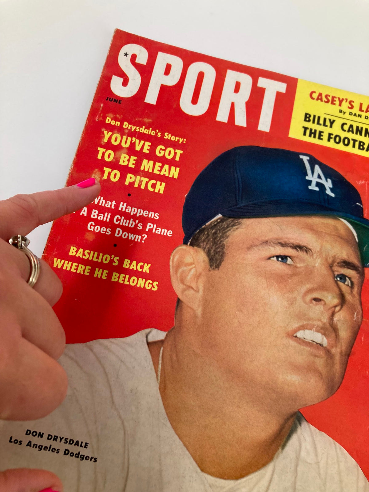 Close-up of the cover of VTG Sport Magazine June 1960 highlighting the headline 'YOU'VE GOT TO BE MEAN TO PITCH' and Don Drysdale's portrait.