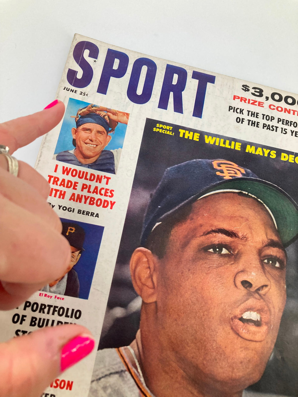 Close-up of the cover of the June 1961 vintage sport magazine showing Willie Mays with text by Yogi Berra and ElRoy Face alongside.