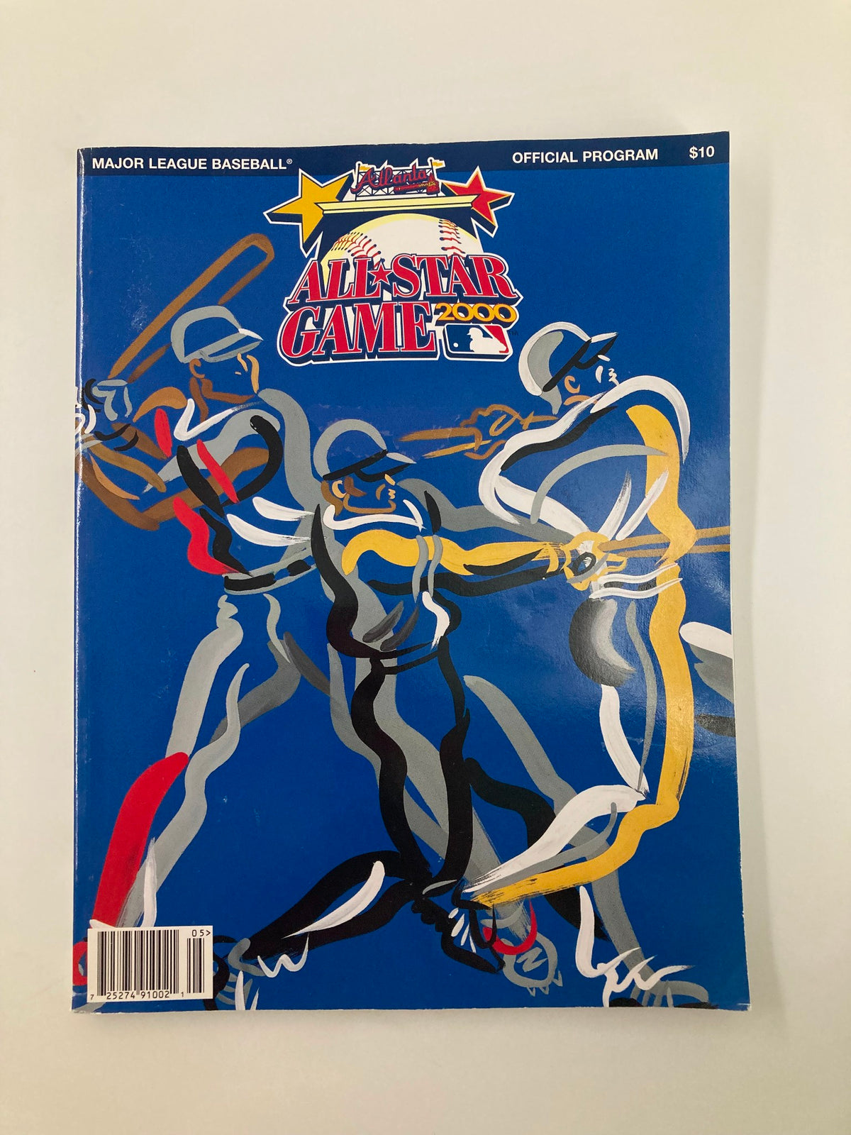 Cover of the 2000 Major League Baseball All Star Game Official Program featuring illustrated players in action.
