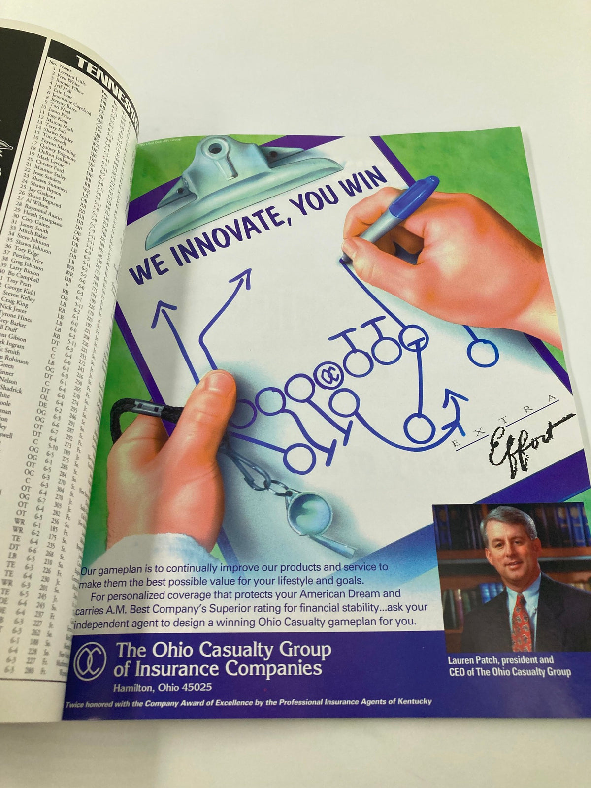 Advertisement from the November 18, 1995 Kentucky Football College Kickoff Official Magazine featuring a football play diagram with promotional content from The Ohio Casualty Group.