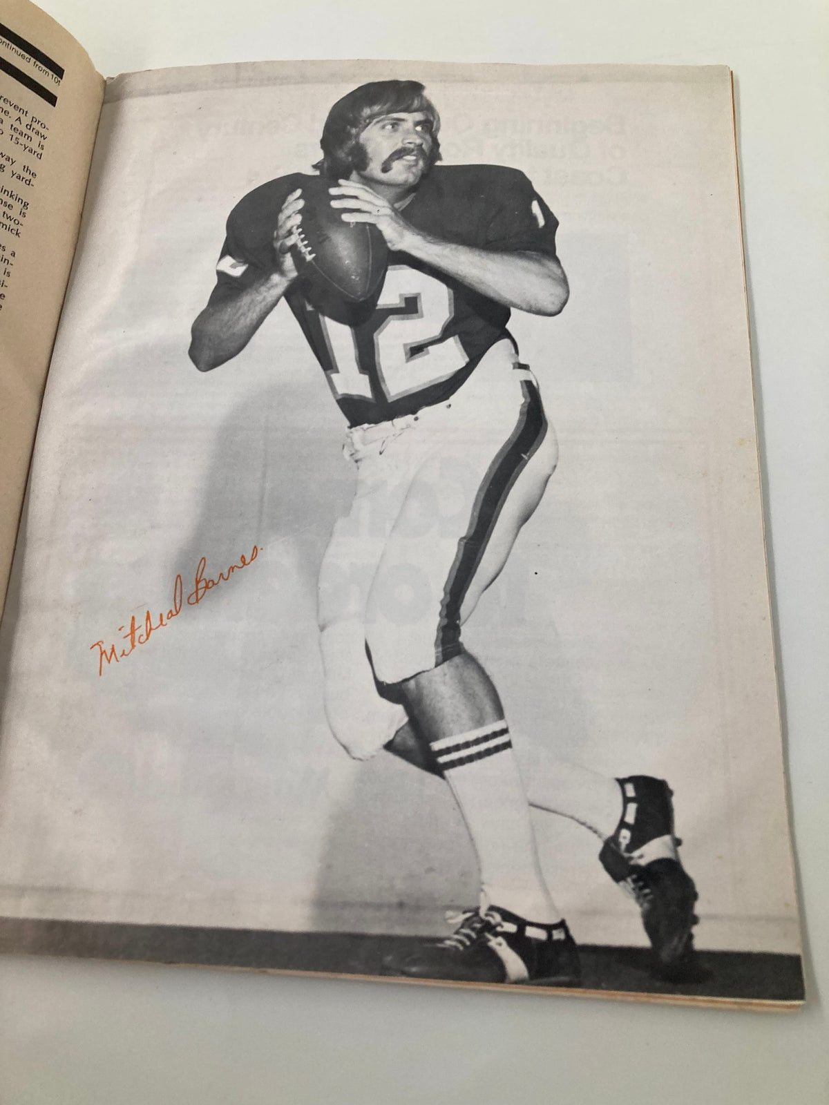 September 18 1976 Football Virginia Tech vs Southern Mississippi Official Program showcasing a black-and-white image of a quarterback in action, emphasizing sports memorabilia from the game.