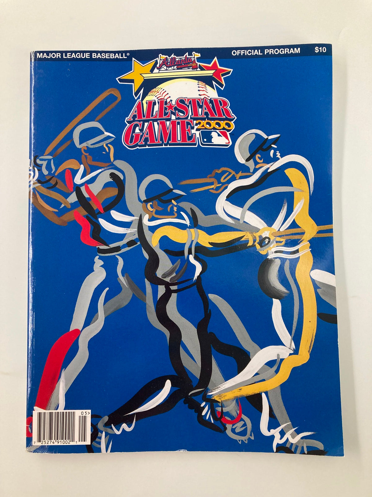 2000 Major League Basketball All Star Game Official Program cover featuring dynamic illustrations of baseball players in action against a blue background.
