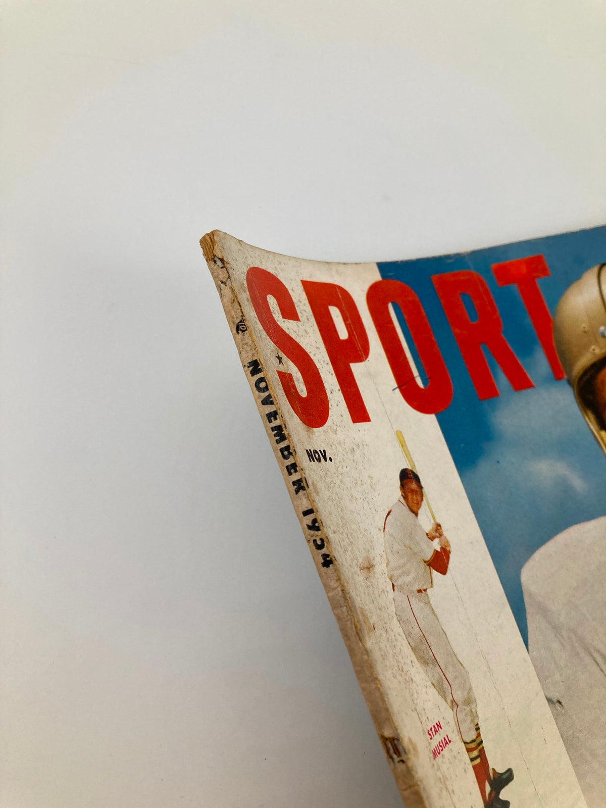 Close-up of the November 1954 VTG Sport Magazine featuring the title prominently displayed on the cover, showcasing vintage sports imagery.