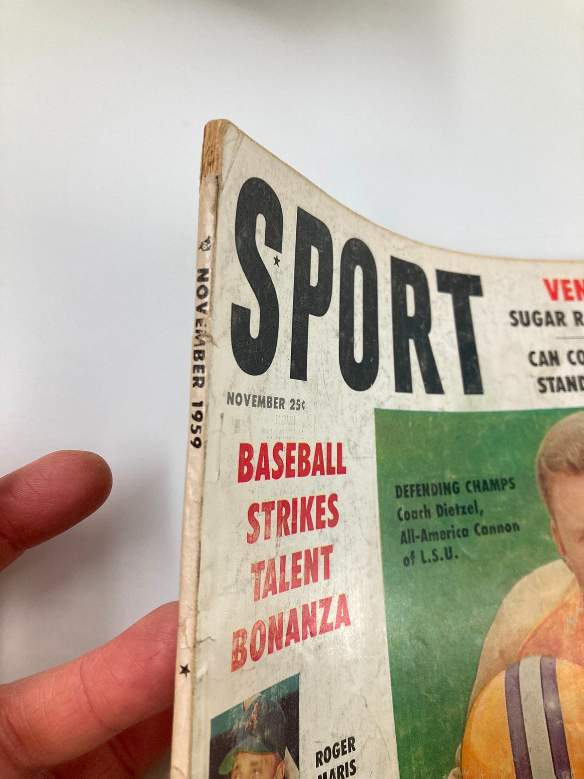 Side view of the VTG Sport Magazine November 1959, revealing the title and a headline about baseball on the front cover.
