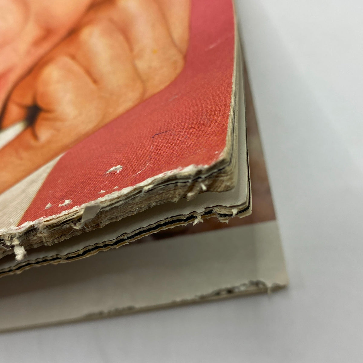 Side view of the Playboy Magazine August 1966 demonstrating the magazine's wear and tear, perfect for collectors interested in vintage items.