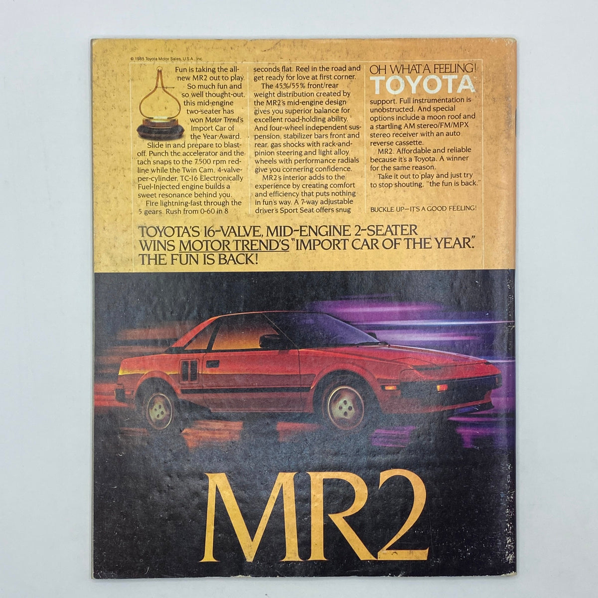 Back cover of VTG Omni Magazine July 1985 showcasing an advertisement for the Toyota MR2, emphasizing its features and award-winning design.