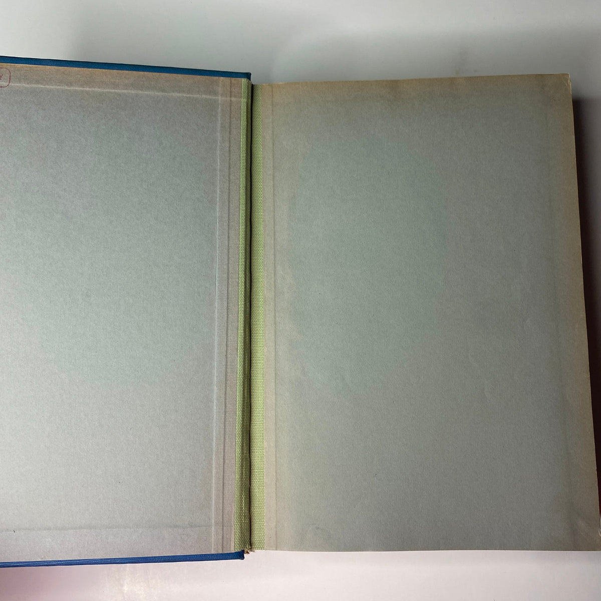 Interior view of the Time Magazine Library Bound Weekly edition, showing the endpapers in light green and creases, dated April 6 to June 29, 1942.