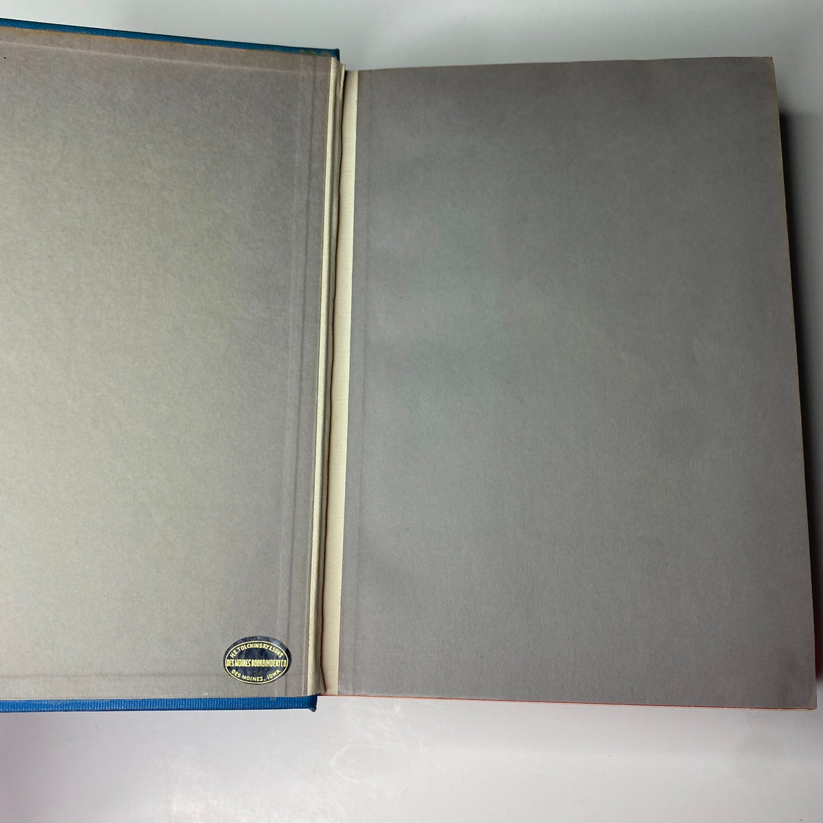 Interior view of the Library Bound Time Magazine July-September 1942 edition, displaying the blank first page with a sticker.
