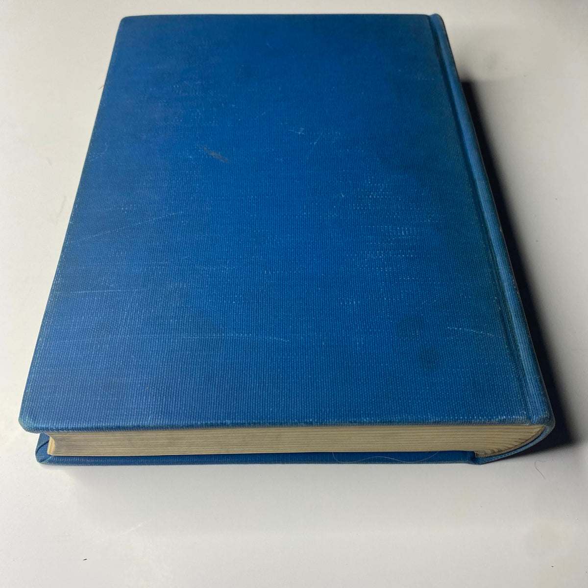 Side view of the blue cloth bound Library Edition of Time Magazine, showcasing its spine and thickness. Time Library Bound Weekly Magazine – April 5 to June 28, 1943.