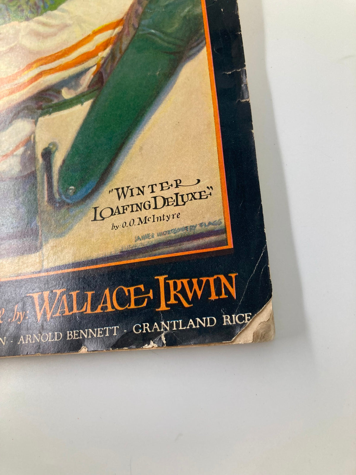 Close-up of the title page of VTG College Humor Magazine January 1928, featuring the title 'Winter Loafing Deluxe' by Wallace Irwin, reflecting the vintage style of 1920s publications.