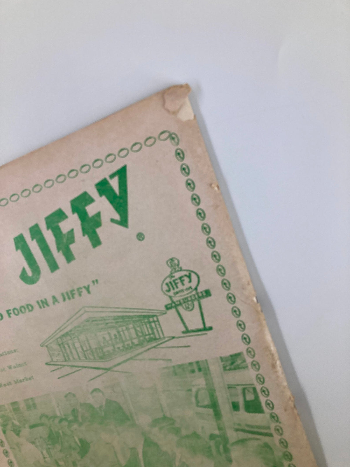 Close-up image of The Jiffy restaurant menu edge, showing wear, from the September 21 1963 Football ETSU Buccaneers vs Murray State Thoroughbreds Program.