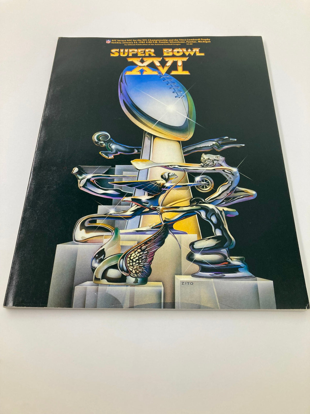 Another view of the January 24 1982 AFC vs NFC NFL Championship Super Bowl XVI Official Program cover showcasing vibrant artwork and the iconic football design.
