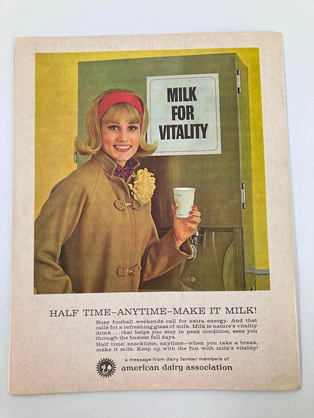 Cover page of a promotional flyer for milk titled 'Milk for Vitality', featuring a young woman with a cup of milk, associated with the October 30, 1965 NCAA Football program for Trinity vs U.S.C.G.A.