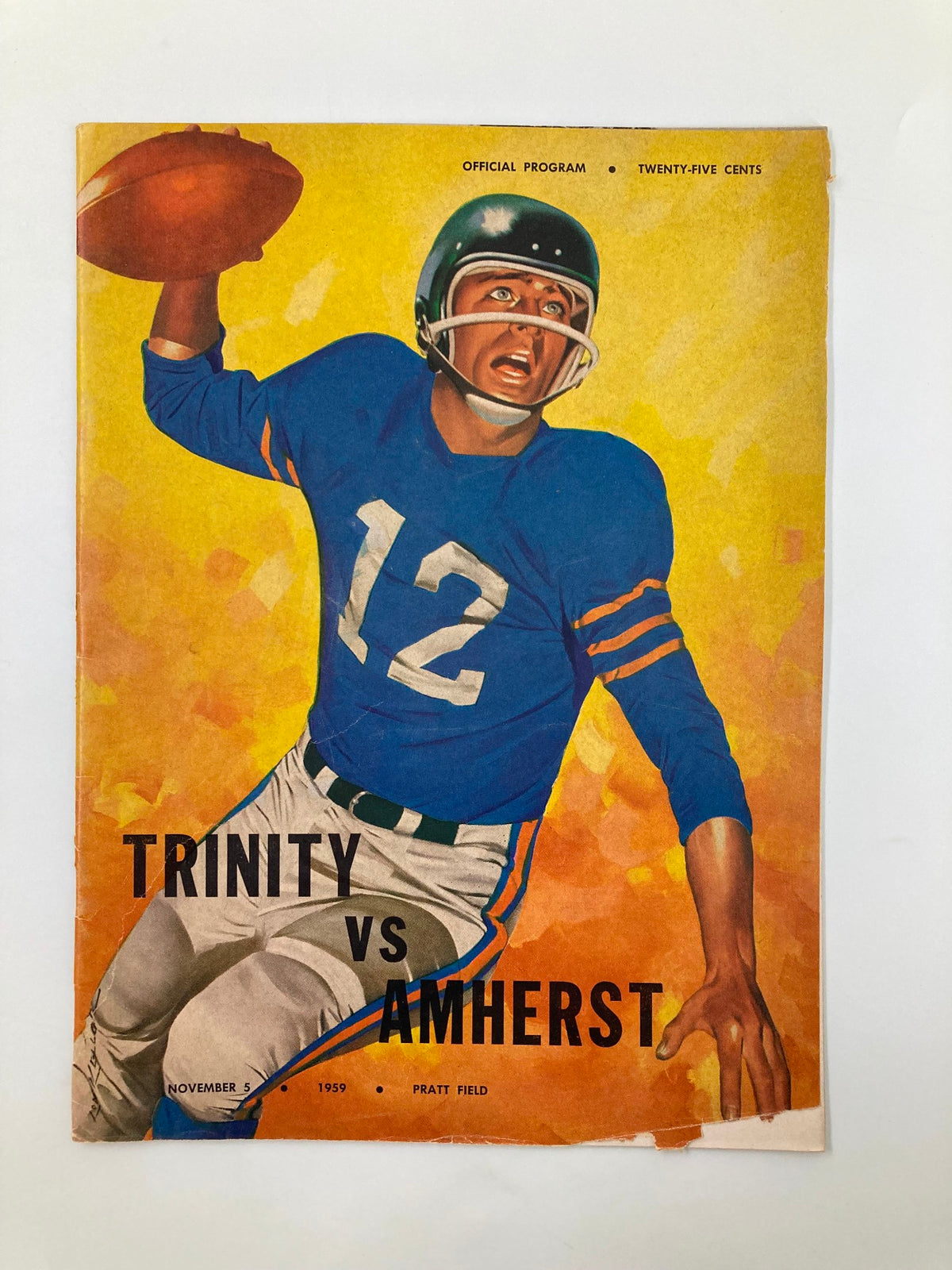 Official program cover for the November 5, 1959 Trinity vs Amherst High School Football game featuring a football player in action.