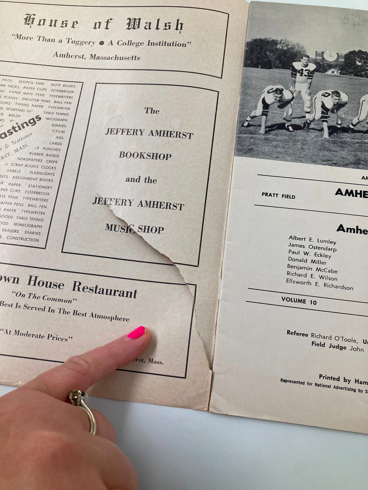 A close-up of the interior page of the November 5 1959 Trinity vs Amherst High School Football Official Program showing details about the Jeffery Amherst Bookshop and the House of Walsh Restaurant.