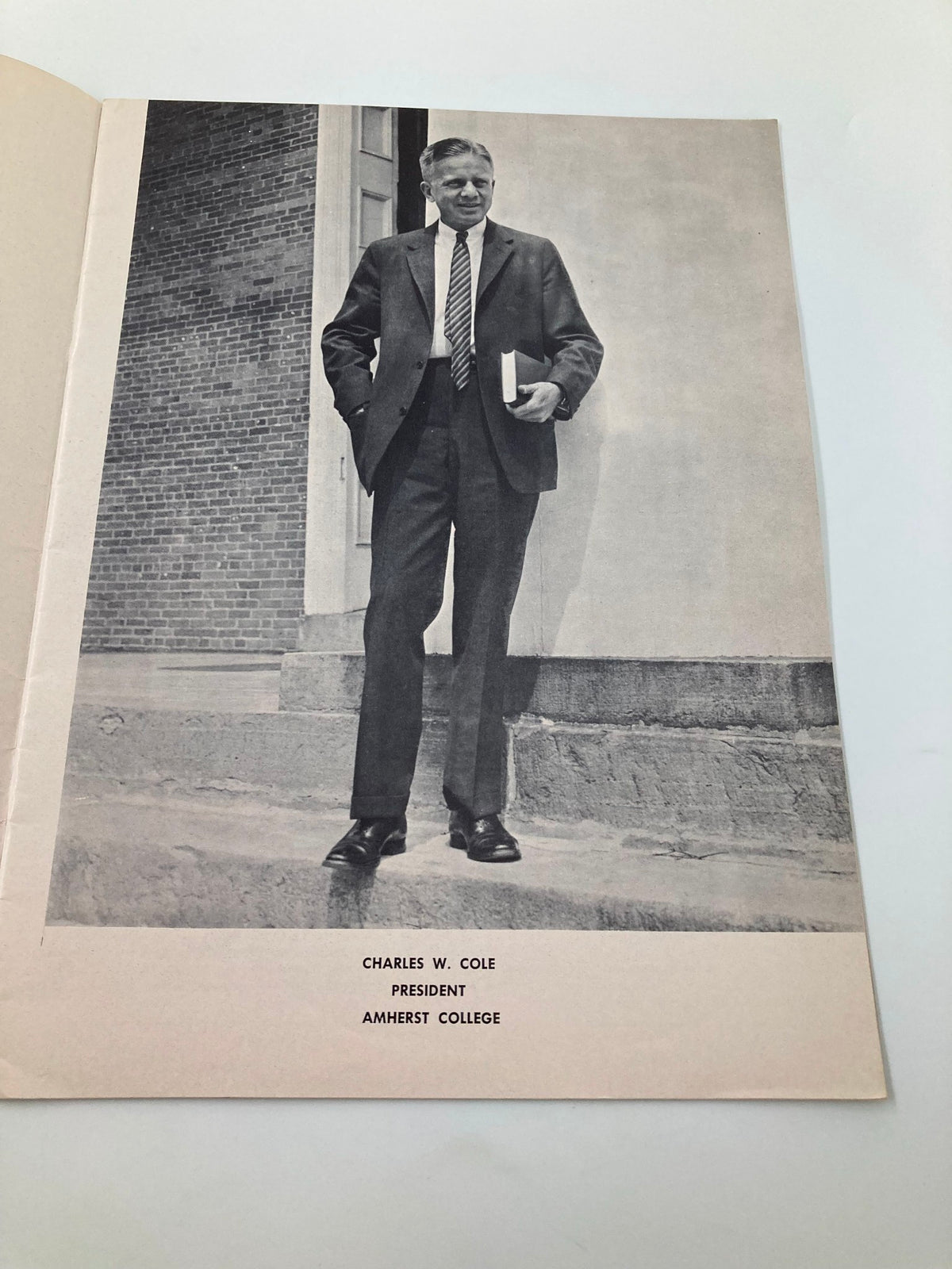 A photograph from the November 5 1959 Trinity vs Amherst High School Football Official Program featuring Charles W. Cole, President of Amherst College.