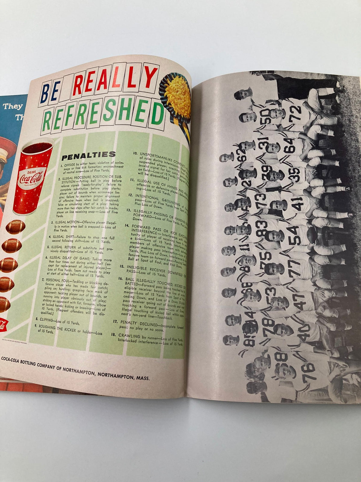 Another page from the November 5 1959 Trinity vs Amherst High School Football program highlighting penalties and featuring an old Coca-Cola advertisement.