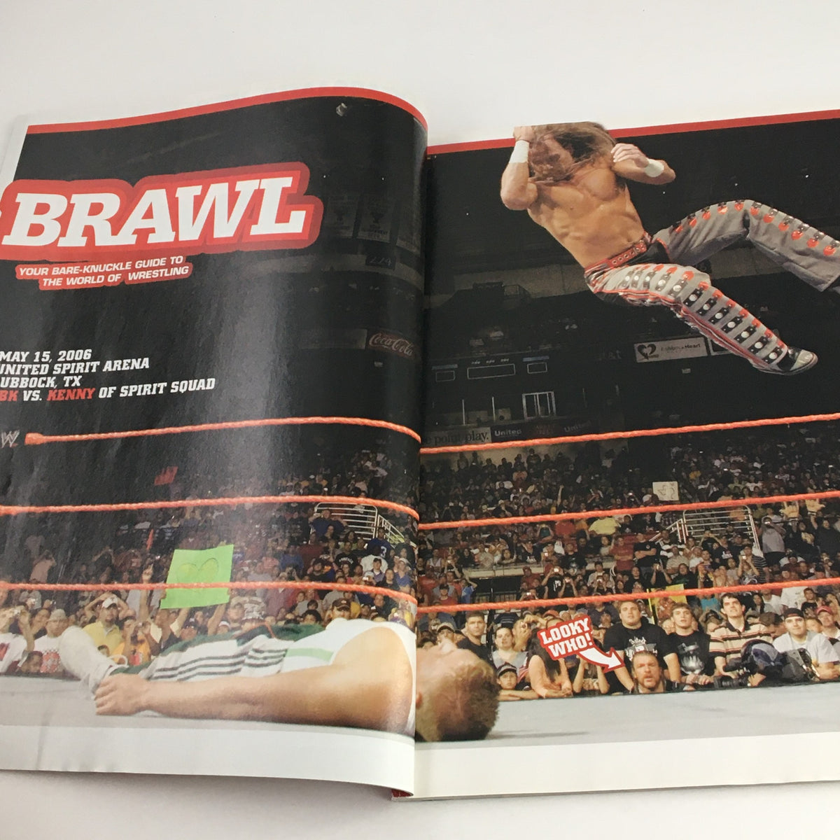 WWE Magazine September 2006 page showcasing a wrestling brawl from May 15, 2006, at the United Spirit Arena.