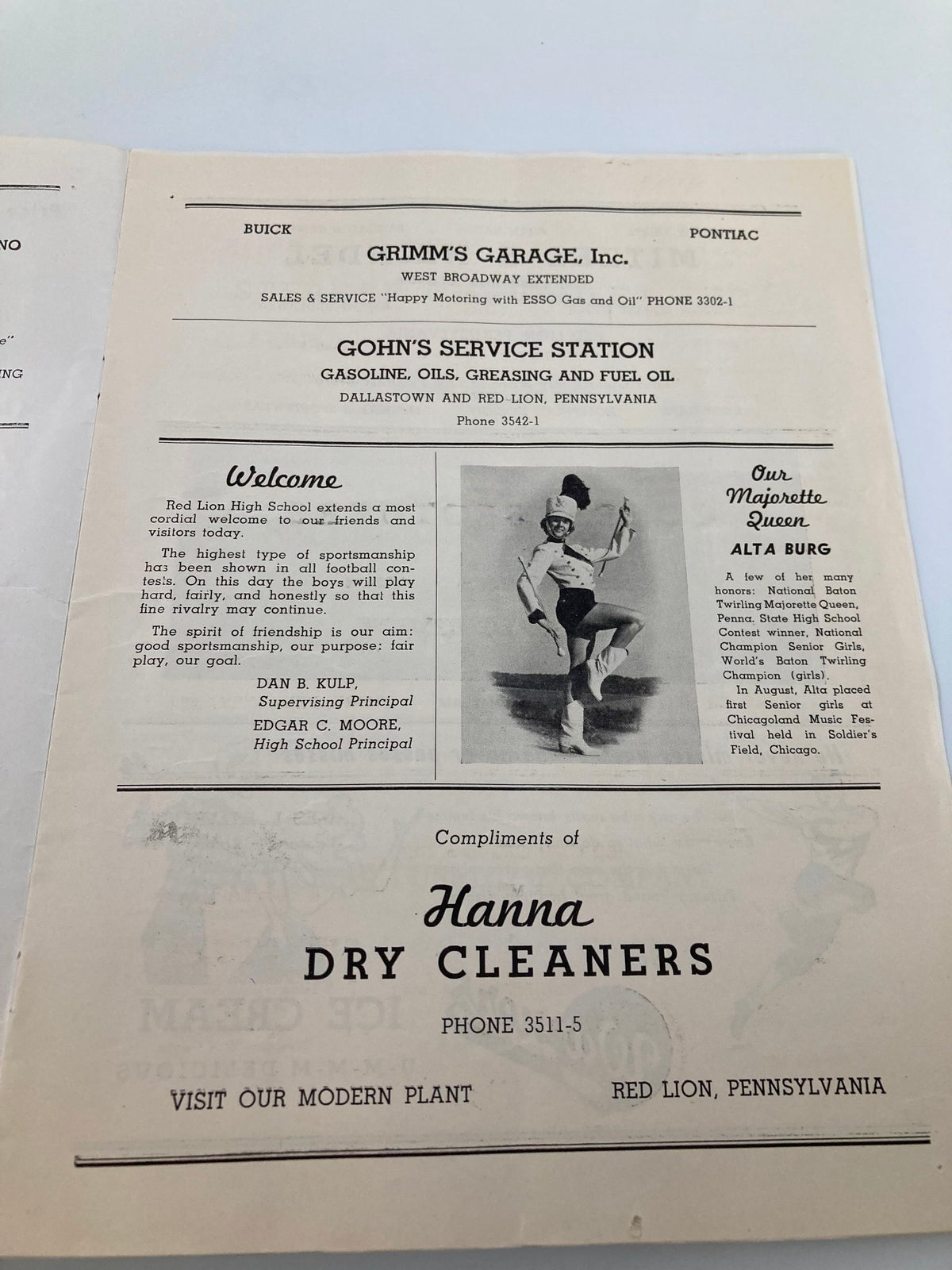 Inside page of the September 13 1952 High School Football program featuring a welcome message and advertisements for local businesses including Grimm's Garage.