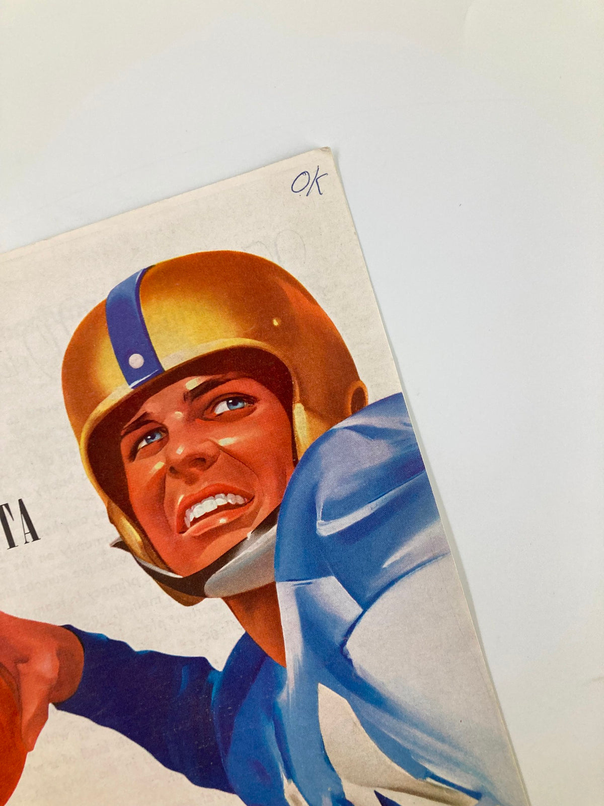 Close-up of the VTG October 25 1958 Football Dubuque vs Buena Vista Homecoming Official Program highlighting the face of a football player in a blue uniform and gold helmet.