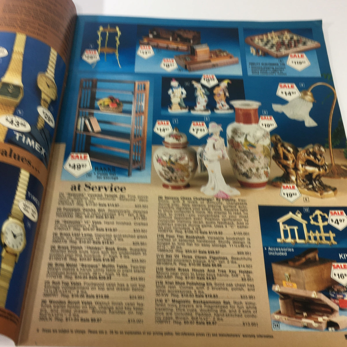 Inside page of the VTG 1982 Service Merchandise Catalog featuring a selection of decorative items and furniture such as a bookshelf, porcelain figures, and vases on sale.
