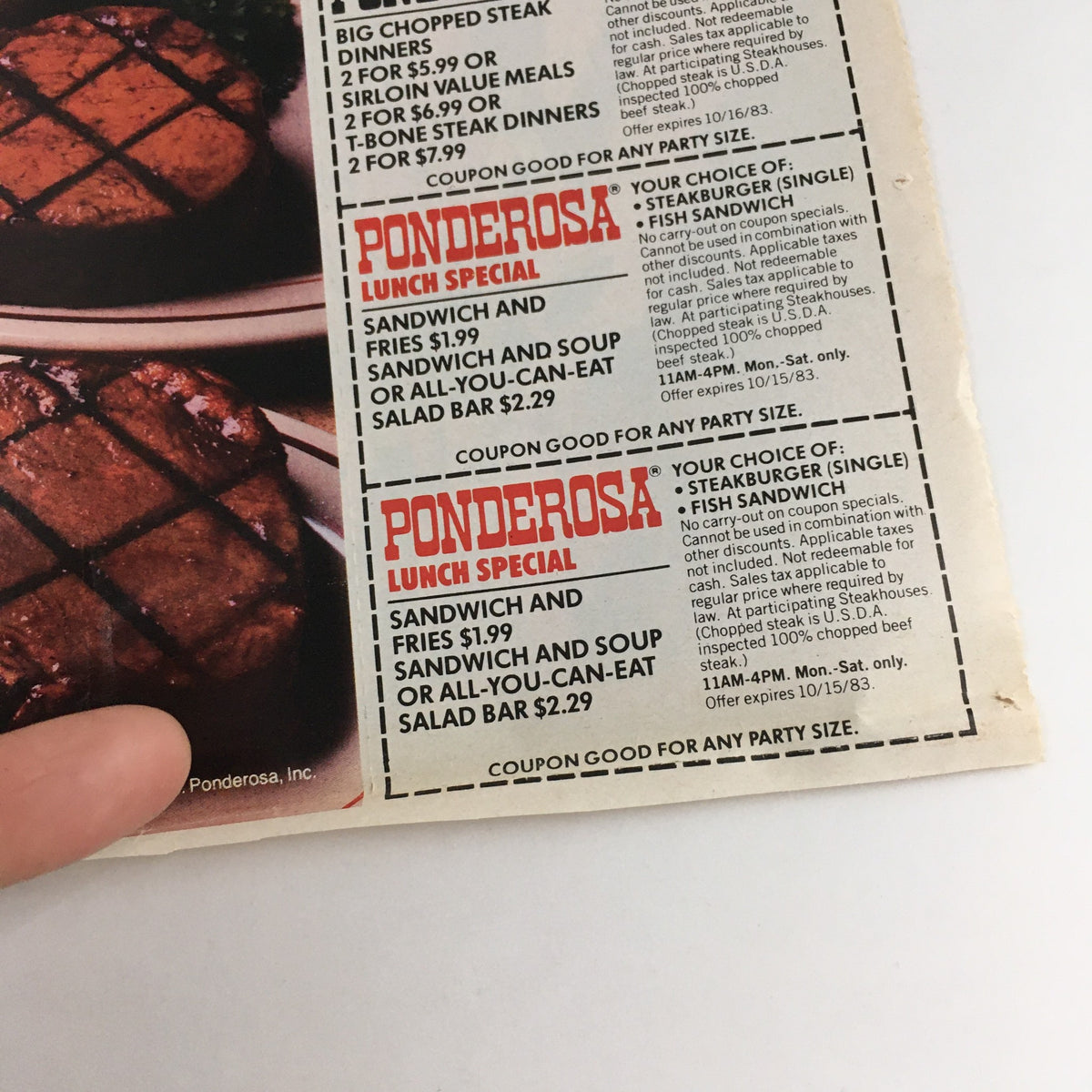 Close-up view of the 1984 Chef Boyardee Savings Rally Circular Coupon Advertisement highlighting Ponderosa lunch specials with prices for sandwiches, fries, and salad bar options, illustrating vintage dining deals.