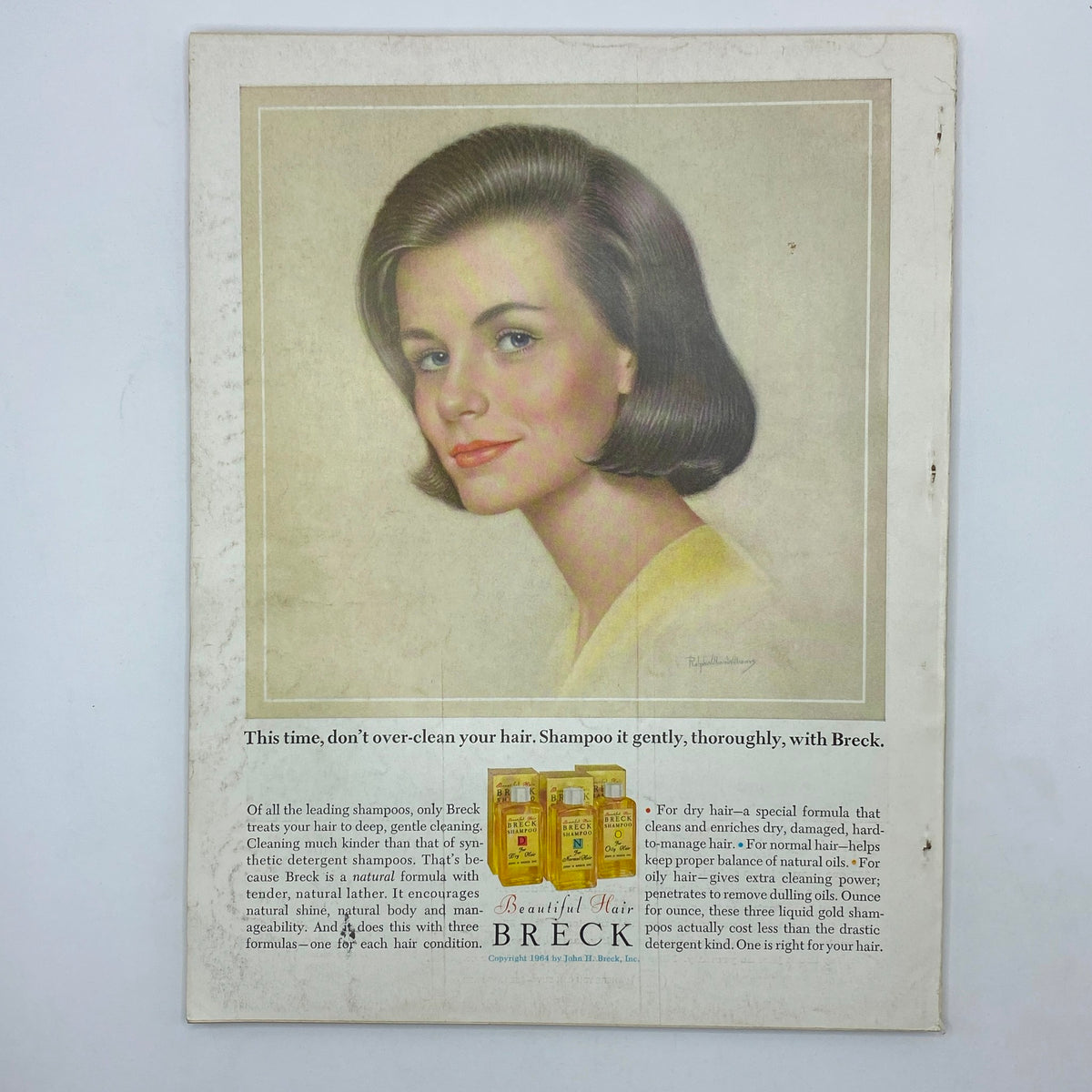 VTG Vogue Magazine April 15 1964 Brigitte Bauer Cover featuring a retro advertisement for Breck shampoo, illustrating a woman with a classic hairstyle, emphasizing vintage beauty products.