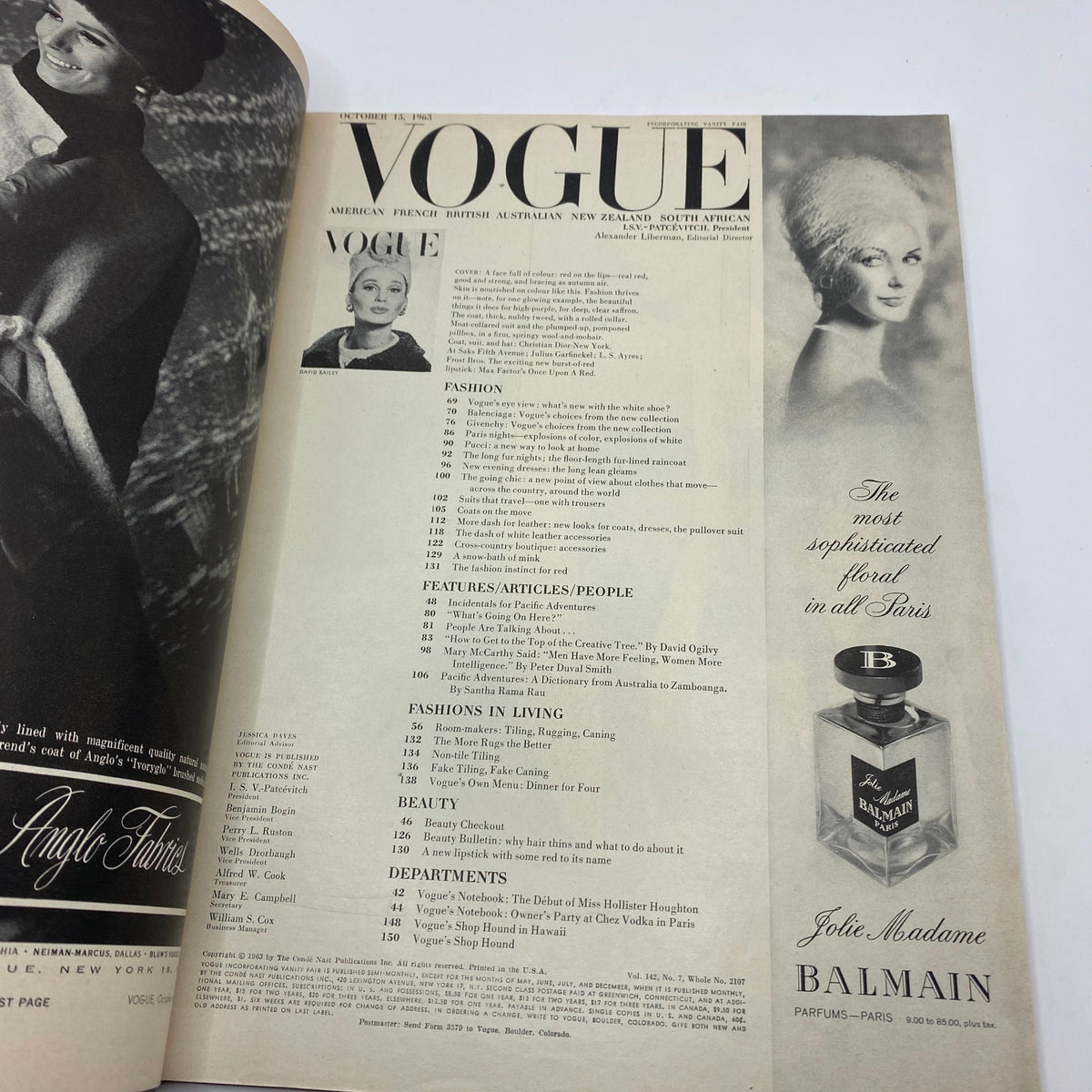 Inside page of the VTG Vogue Magazine from October 15, 1963 featuring the title 'VOGUE' with a black and white photograph, showcasing high fashion. This issue includes content and listings related to fashion and beauty trends of the early 1960s.