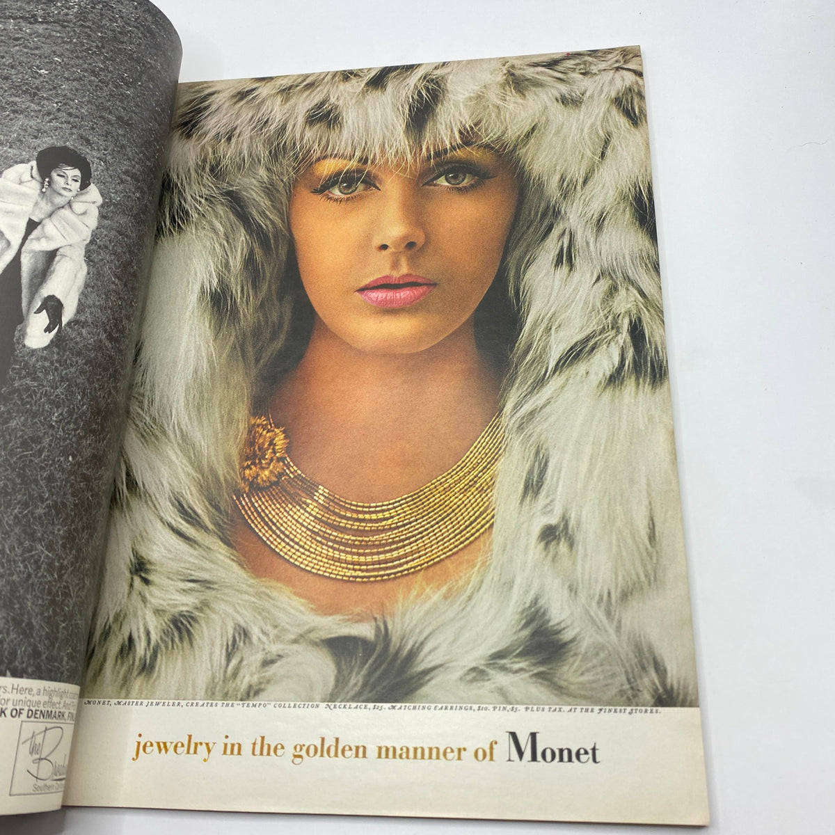 Inside page of VTG Vogue Magazine October 15 1963 showcasing a stunning close-up of a woman wearing elegant jewelry in a fur coat.