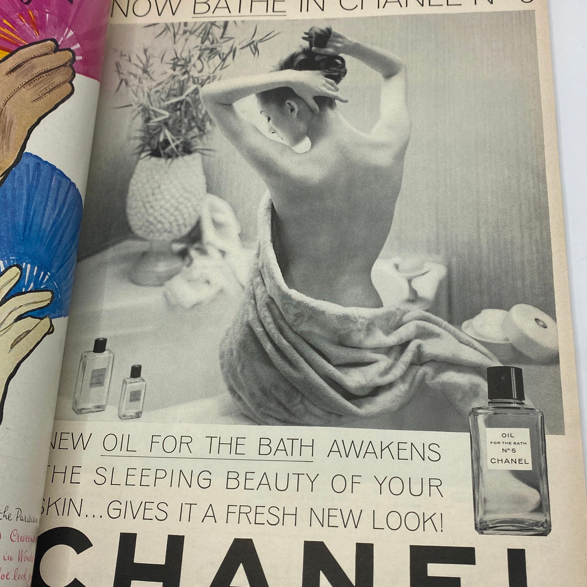 Ad page from VTG Vogue Magazine March 15, 1964, featuring a model wrapped in a towel promoting Chanel No. 5 bath oil, highlighting iconic beauty trends.