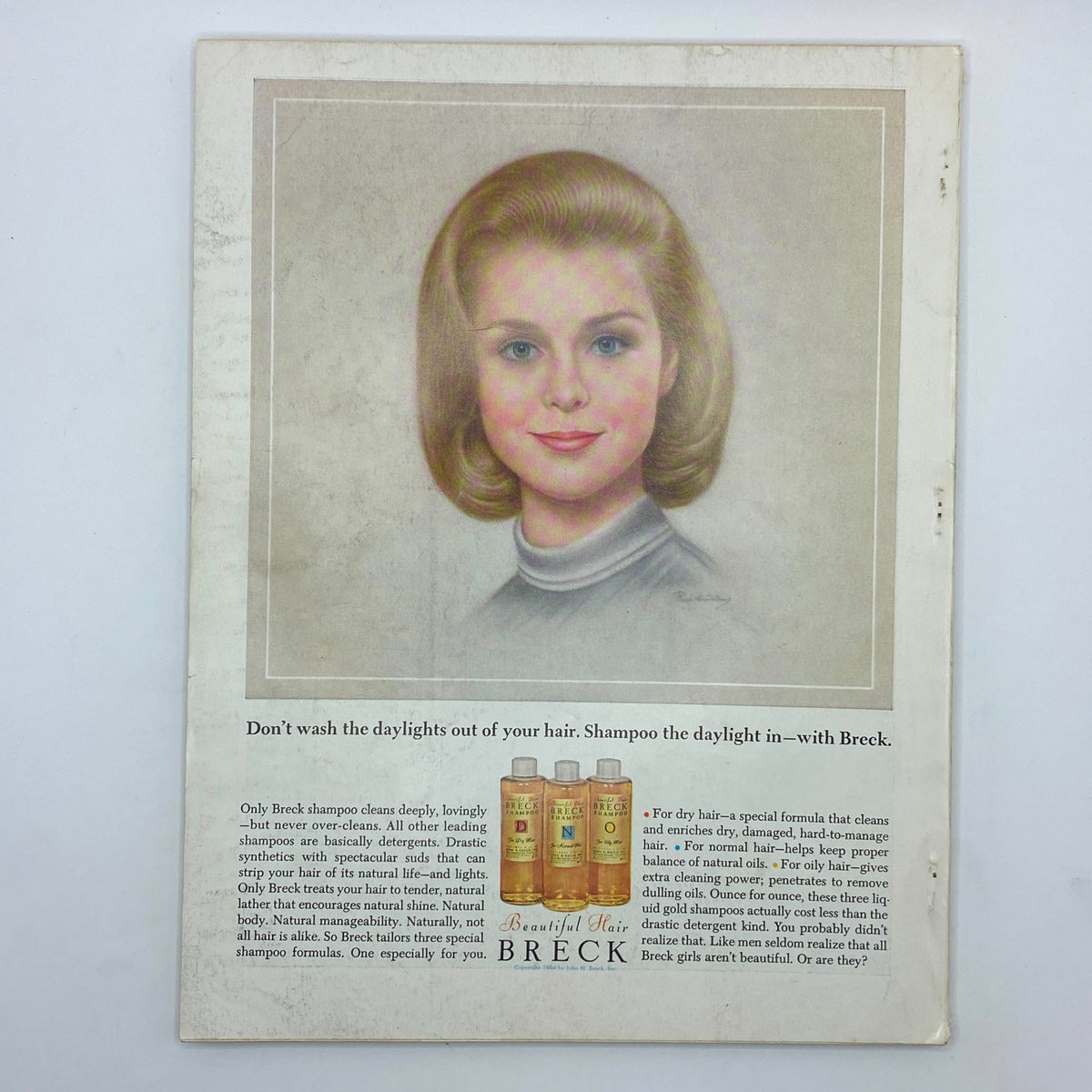 VTG Vogue Magazine March 15, 1964 Brigitte Bauer Cover showcasing a vintage advertisement for Breck shampoo with a portrait of a young woman and details about hair care.