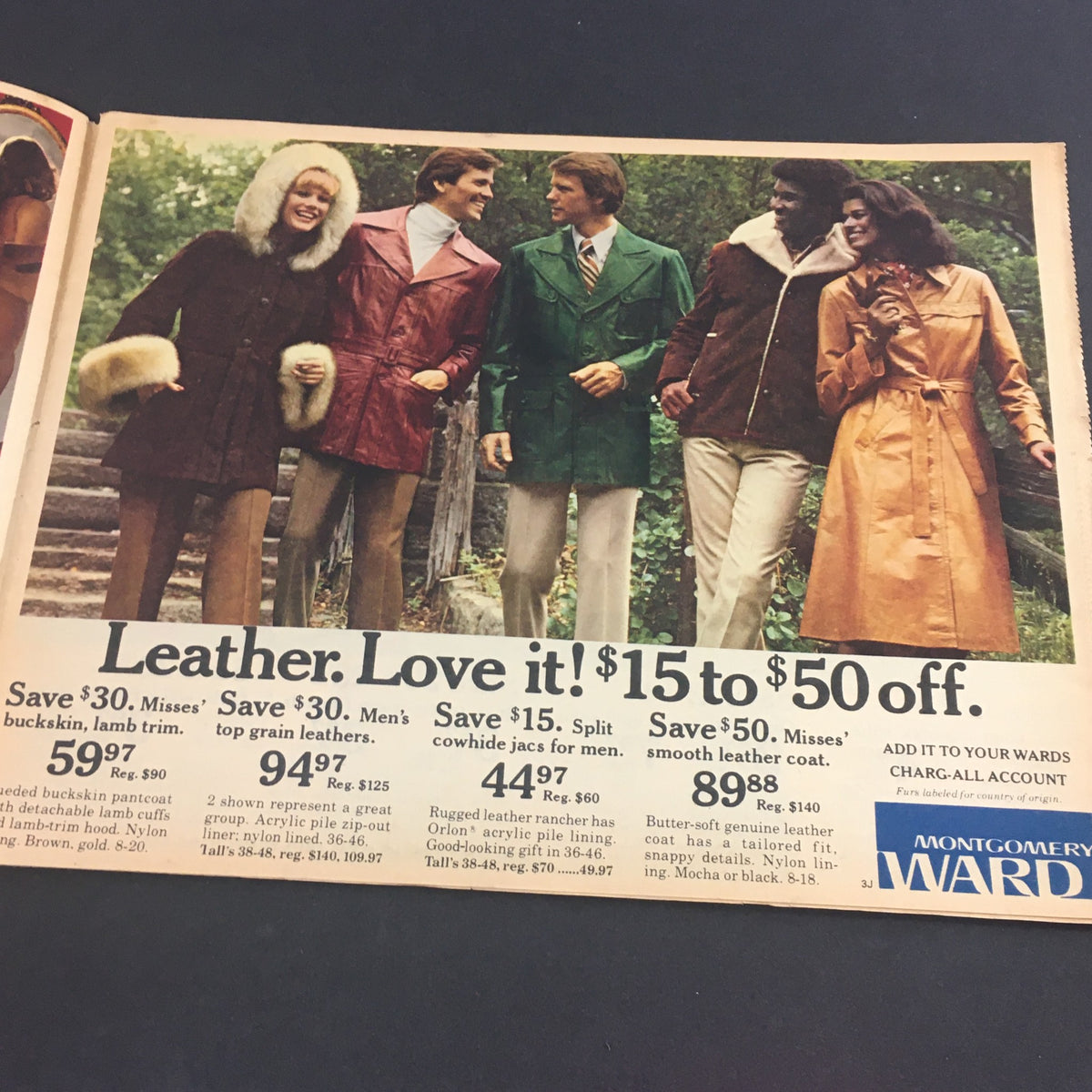 VTG November 27 1977 Montgomery Ward Holiday Value Sale Circular showcasing a group in fashionable coats, highlighting savings on leather outerwear.