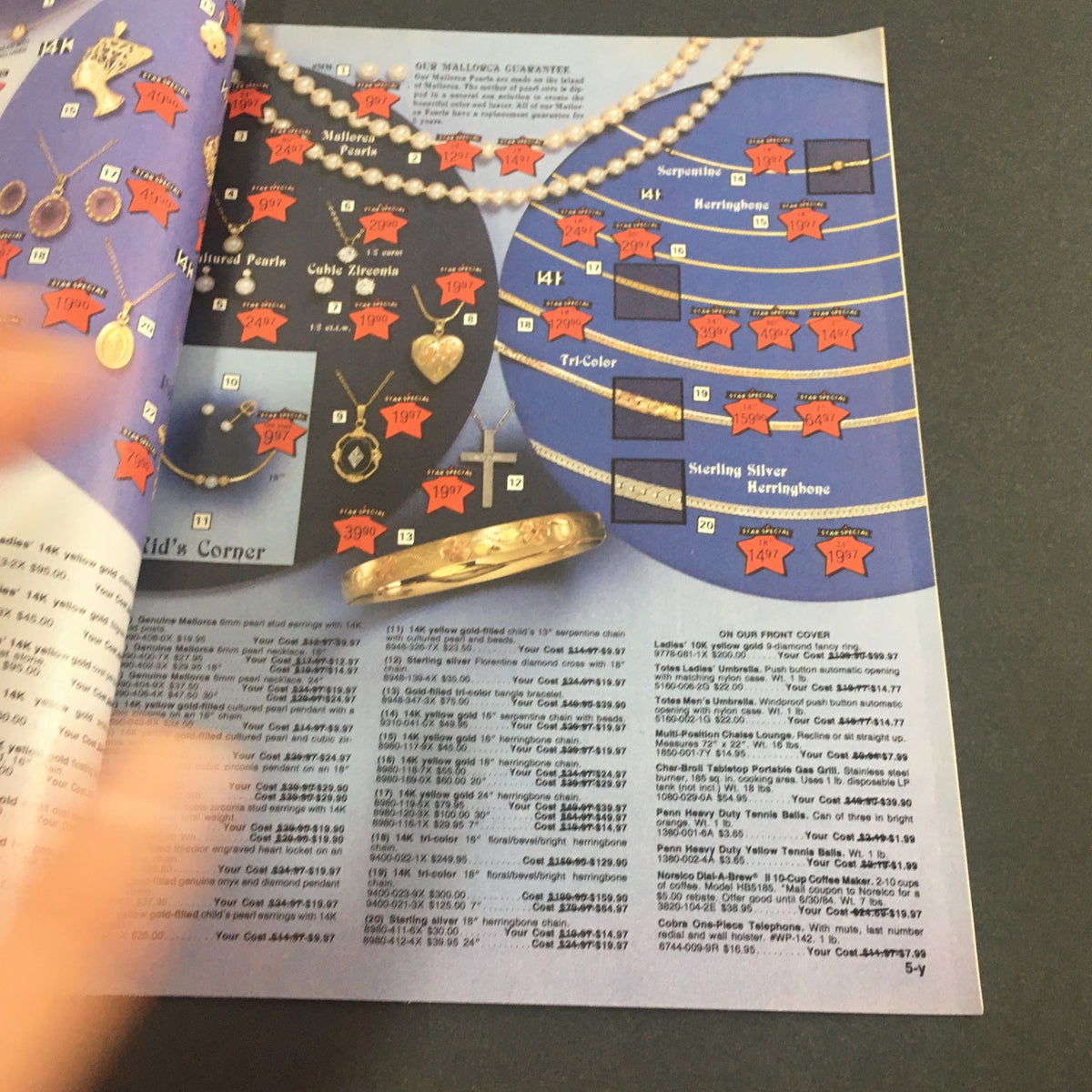 VTG April 28 1984 Present Co. Totes, Norelco, Cobra, Char-Boil Spring Catalog showcasing a page with various jewelry items and prices highlighted.