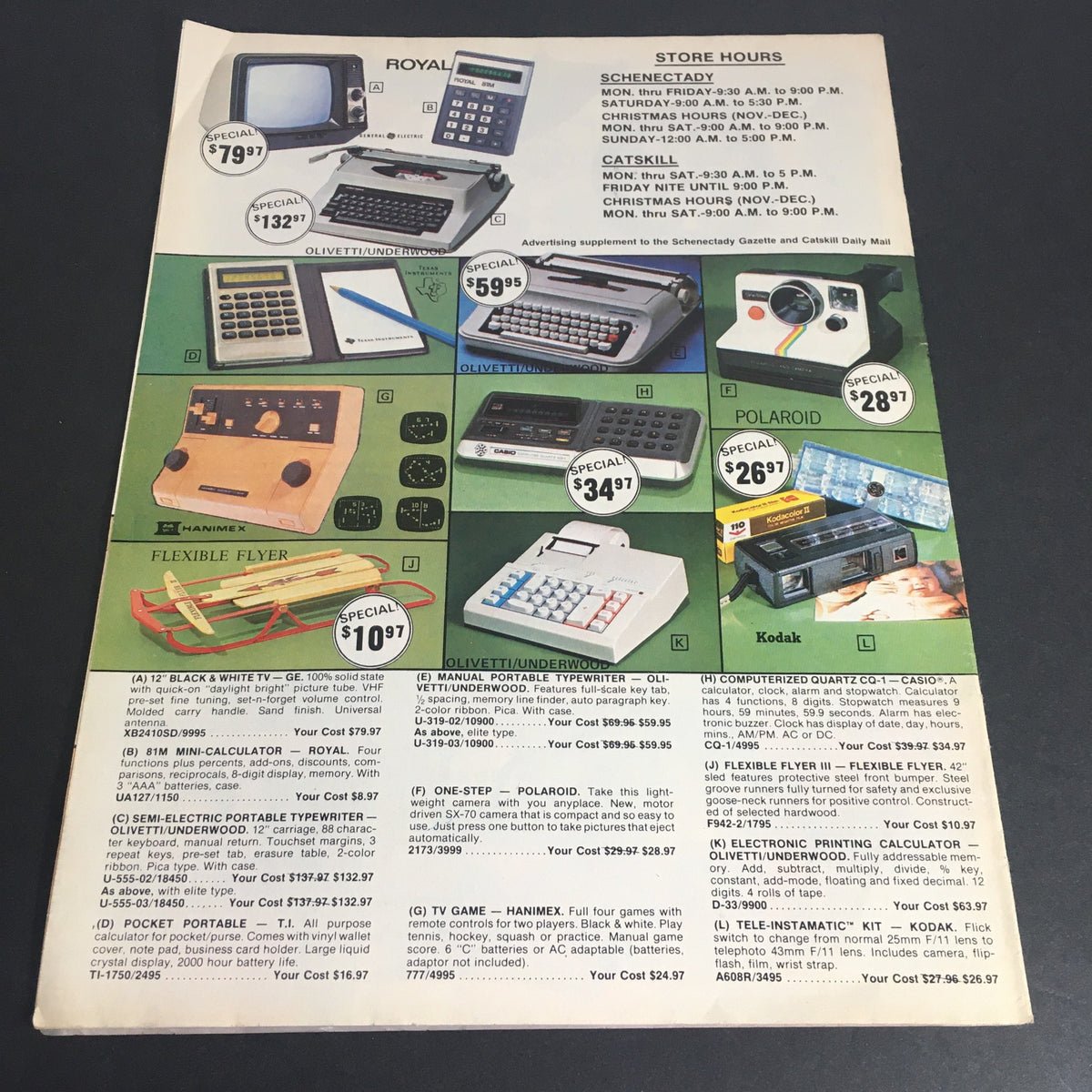 VTG November 1977 Townsmen Christmas Supplement featuring electronics like calculators, a Polaroid camera, and products from Royal, with promotional pricing.