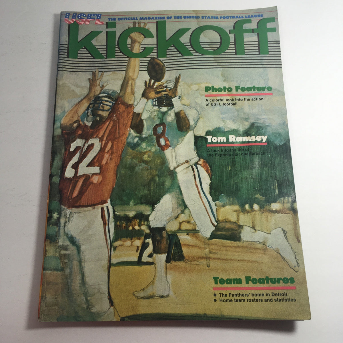 Cover of the USFL Kickoff Official Magazine 1983 Vol. 1 #5 featuring Tom Ramsey, highlighting the excitement of USFL football with vibrant illustrations and player action.