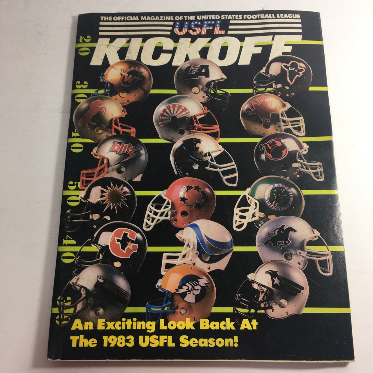 Cover of the VTG USFL Kickoff Official Magazine 1984 Vol 2 #1, showcasing various football helmets. An exciting look back at the 1983 USFL season.