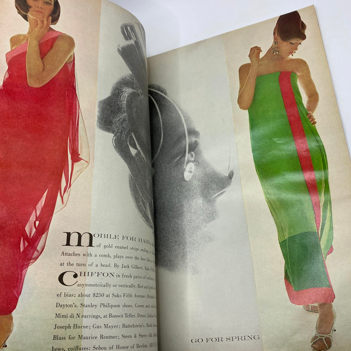 Fashion layout featuring models in vibrant dresses from the VTG Vogue Magazine January 15, 1966, showcasing innovative styles of the 1960s.