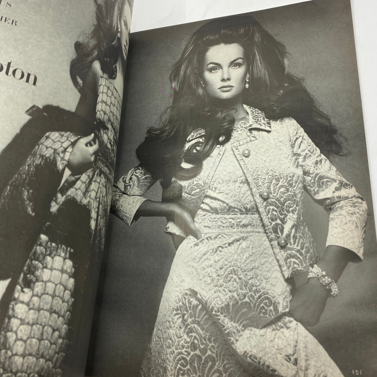 Stylish black and white photo from VTG Vogue Magazine November 1 1967, featuring model Sue Murray in an elegant outfit. This striking image embodies the fashion trends of the 1960s, captured by renowned photographer Irving Penn.