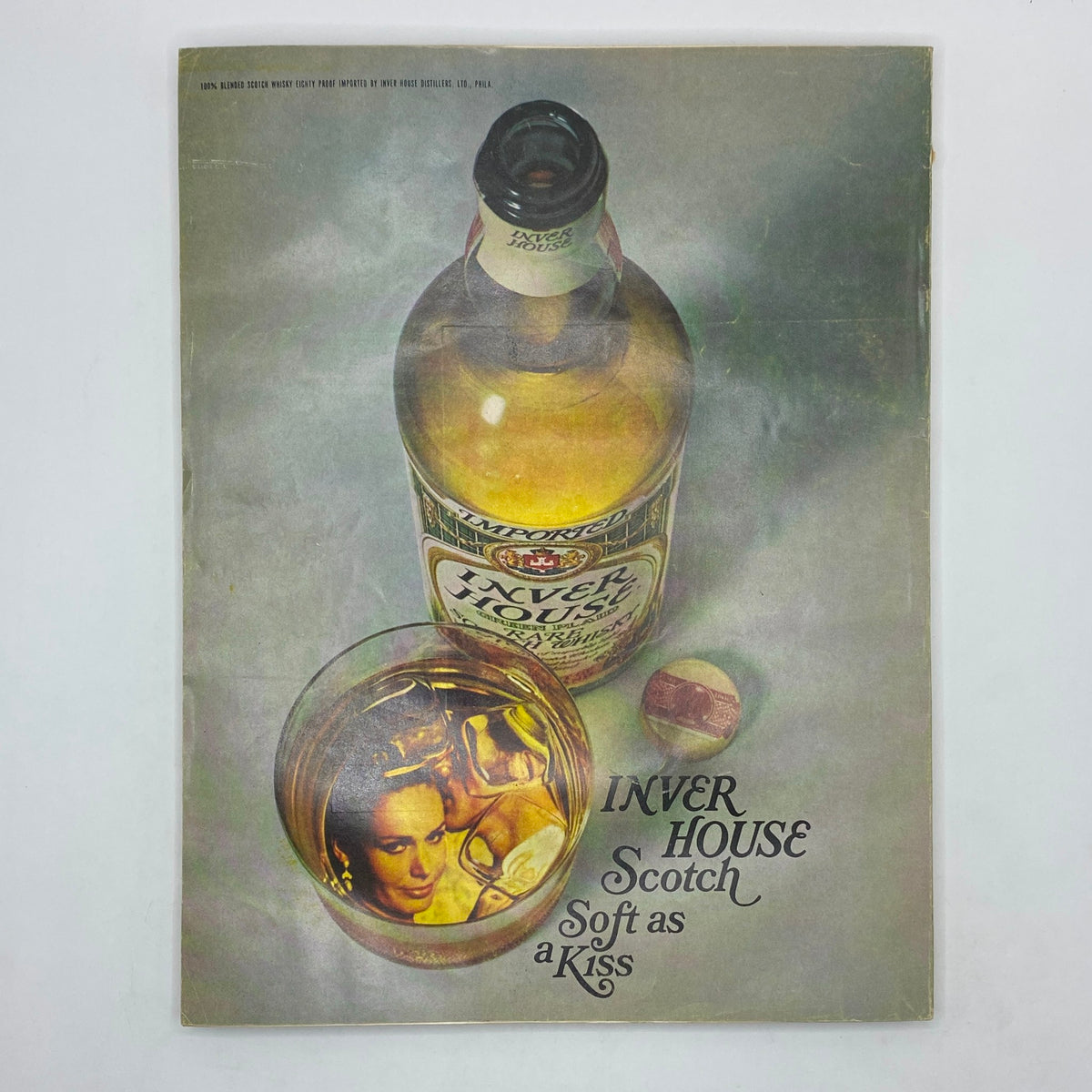Back cover of the VTG Vogue Magazine November 1 1967, advertising Inver House Scotch with a striking image of a whisky bottle and a glass featuring a romantic scene, emphasizing vintage advertising aesthetics.