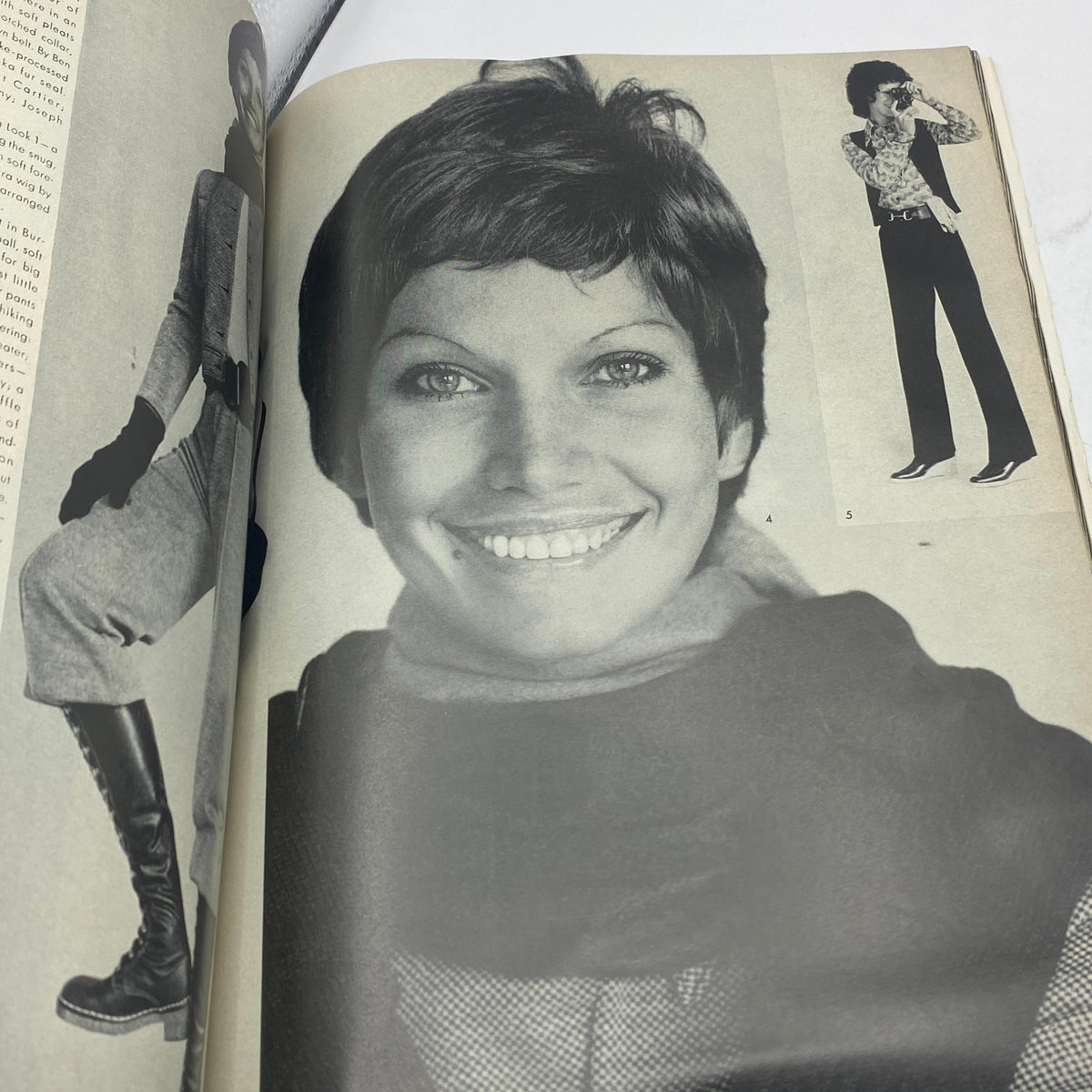Fashion page from VTG Vogue Magazine October 15 1971, displaying a model with a chic hairstyle and contemporary fashion outfits.
